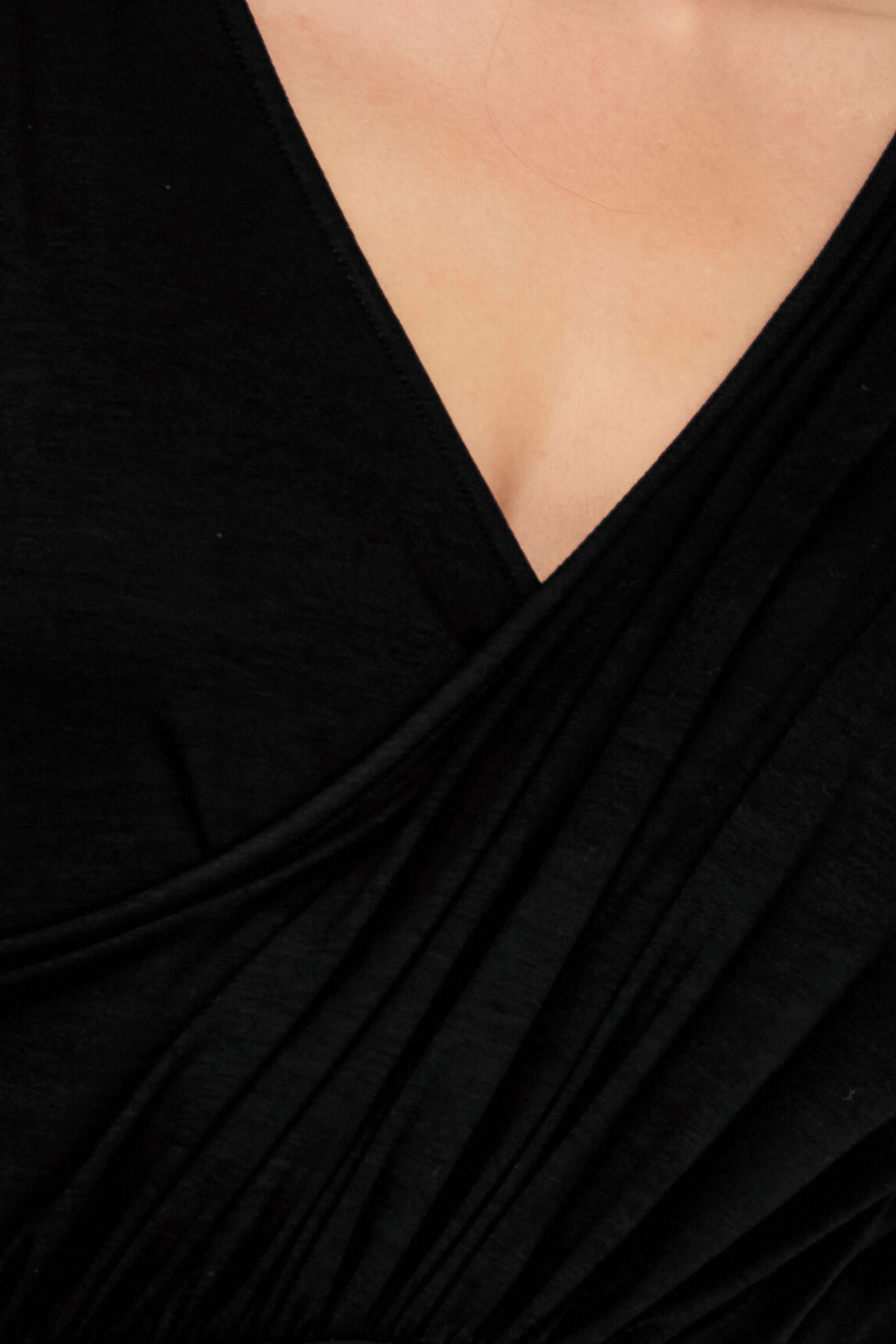 Black bodysuit with cushions and draping