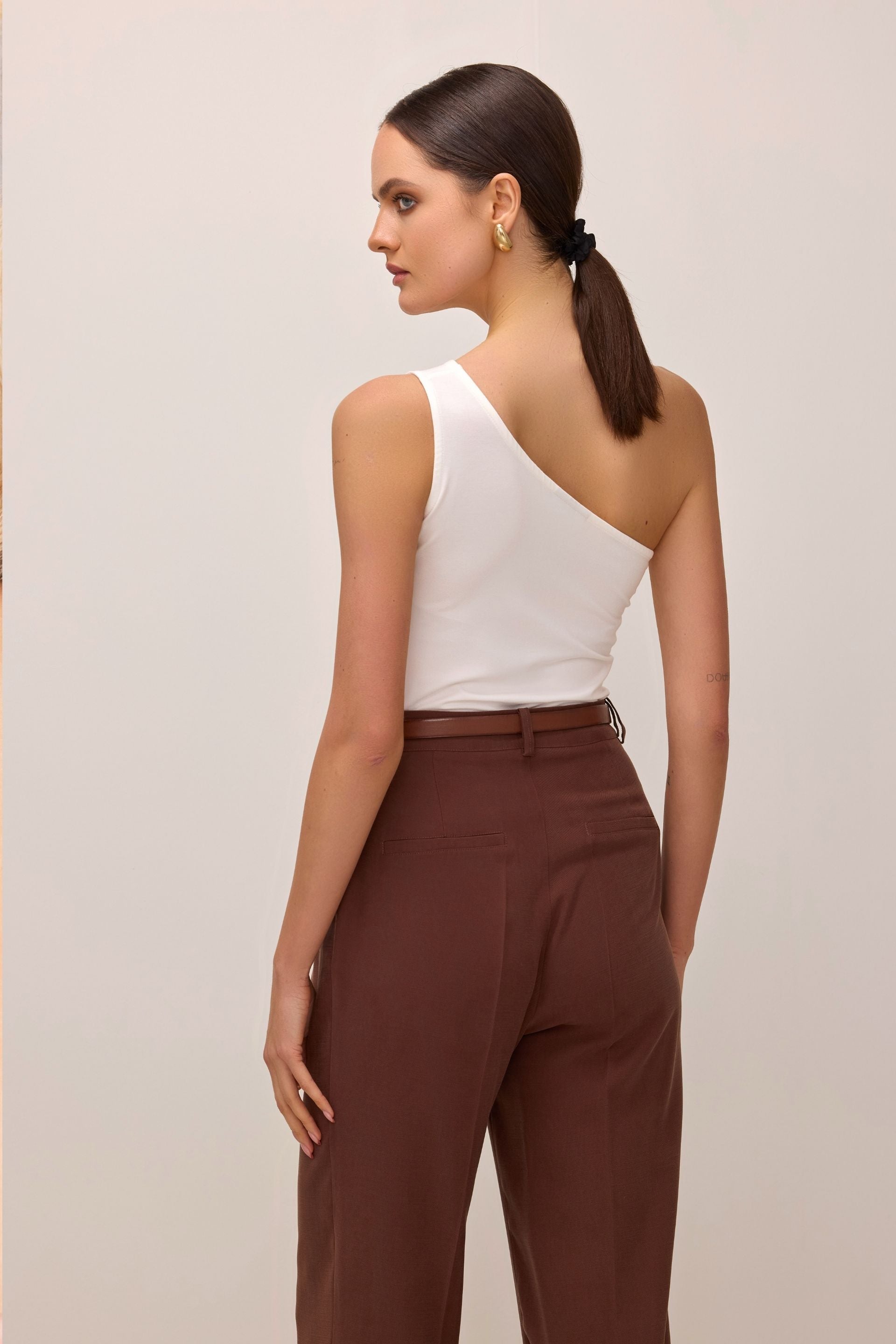 Cream white one-shoulder blouse
