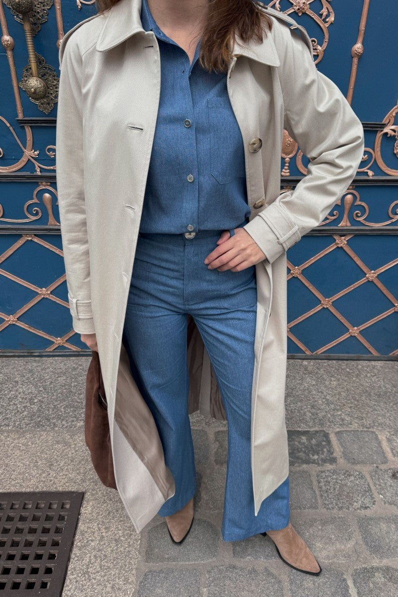 Navy blue denim trousers with patch pockets