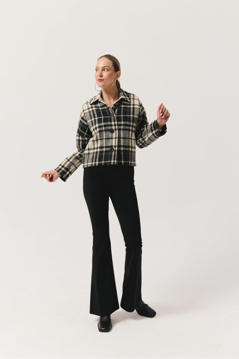 Black cotton knit flared trousers