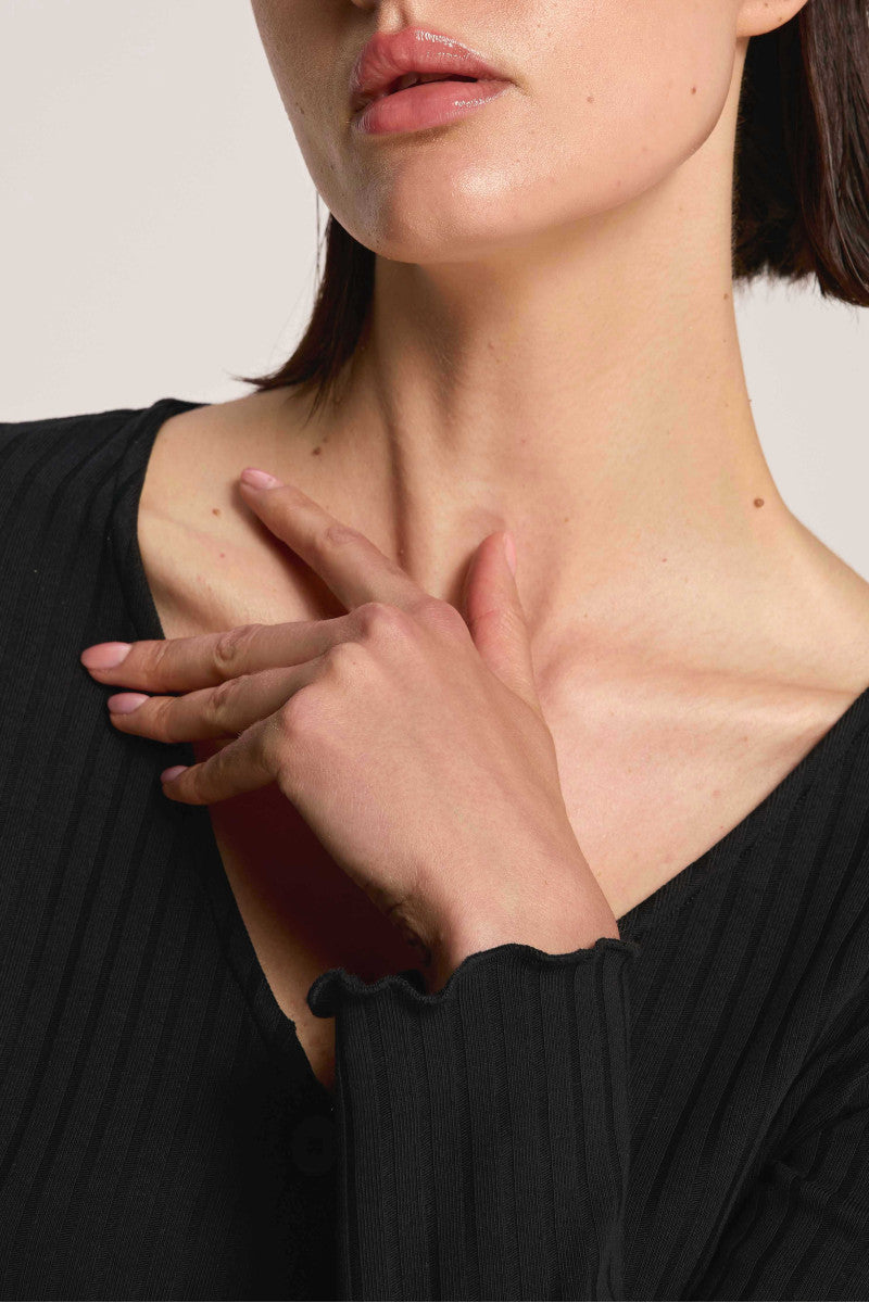 Black V-neck button-down blouse